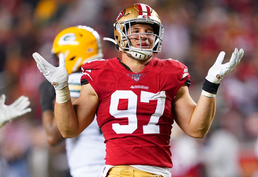 SANTA CLARA, CALIFORNIA - NOVEMBER 24: Nick Bosa #97 of the San Francisco 49ers celebrates after the sacked the quarterback against the Green Bay Packers during the first half of an NFL football game at Levi's Stadium on November 24, 2019 in Santa Clara, California. The 49ers won the game 37-8. (Photo by Thearon W. Henderson/Getty Images)