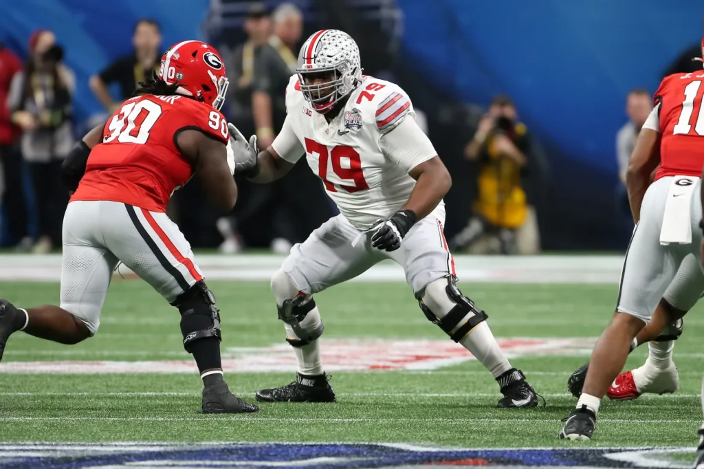 Dawand Jones in pass protection for the Ohio State football team against Georgia in the Peach Bowl. | Image Credit: Michael Wade/Icon Sportswire via Getty Images