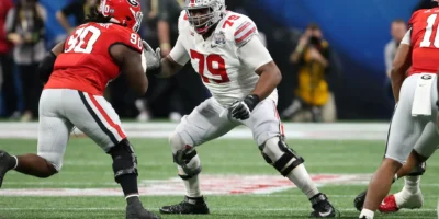 Dawand Jones in pass protection for the Ohio State football team against Georgia in the Peach Bowl. | Image Credit: Michael Wade/Icon Sportswire via Getty Images
