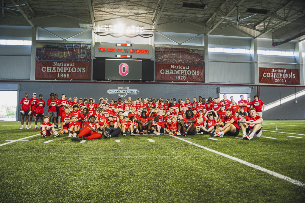Ohio State players with the kids at the Next Gen Youth Football Camp at the Woody Hayes Athletic Center