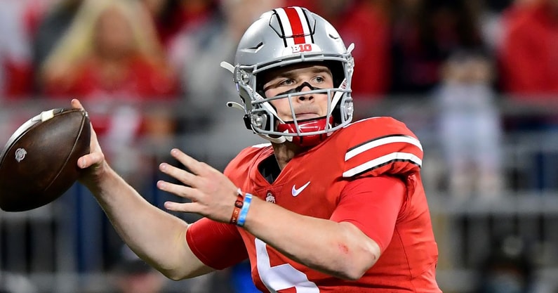 Ohio State third-year quarterback Kyle McCord is battling with second-year signal caller Devin Brown for the starting spot under center. (Emilee Chinn/Getty Images)