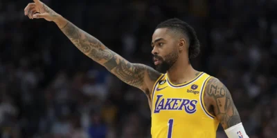 D’Angelo Russell, who is returning to the Lakers on a two-year, $36 million contract he signed as a free agent over the summer, will open this season as their starting point guard. (AP Photo/Jack Dempsey)
