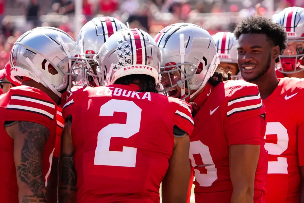 Sep 21, 2024; Columbus, Ohio, USA; Ohio State Buckeyes wide receiver Emeka Egbuka (2) celebrates with teammates after scoring a touchdown in the first quarter at Ohio Stadium on Saturday. | Photo Credit: Samantha Madar/Columbus Dispatch