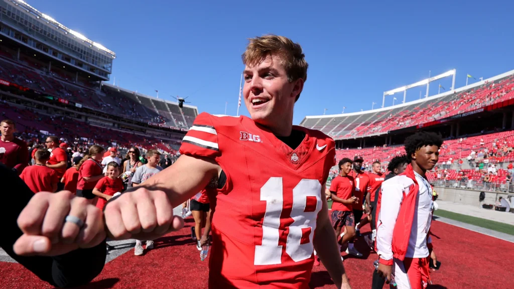 Sep 21, 2024; Columbus, Ohio, USA; Ohio State Buckeyes quarterback Will Howard (18) celebrates following the win against the Marshall Thundering Herd at Ohio Stadium. Mandatory Credit: Joseph Maiorana-Imagn Images