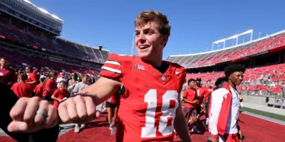 Sep 21, 2024; Columbus, Ohio, USA; Ohio State Buckeyes quarterback Will Howard (18) celebrates following the win against the Marshall Thundering Herd at Ohio Stadium. Mandatory Credit: Joseph Maiorana-Imagn Images