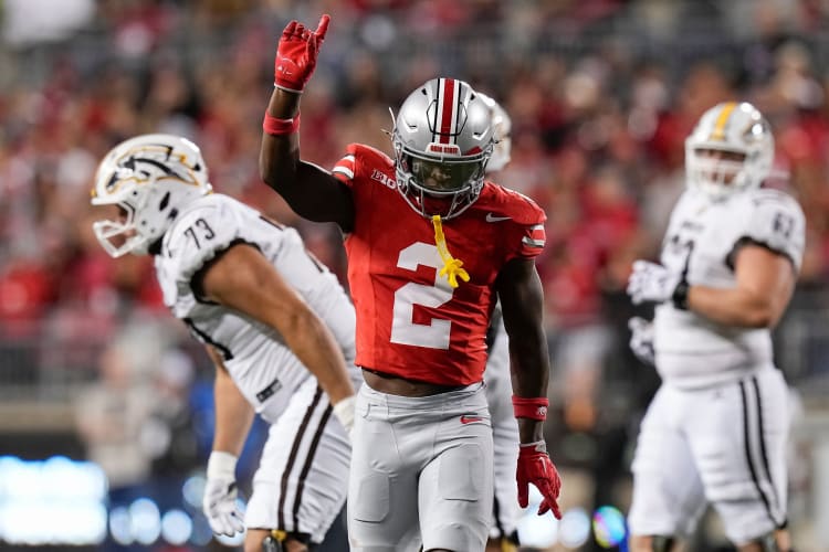 Ohio State Buckeyes safety Caleb Downs celebrates a play against the Western Michigan Broncos. — Source: (Adam Cairns/Columbus Dispatch / USA TODAY NETWORK via Imagn Images)
