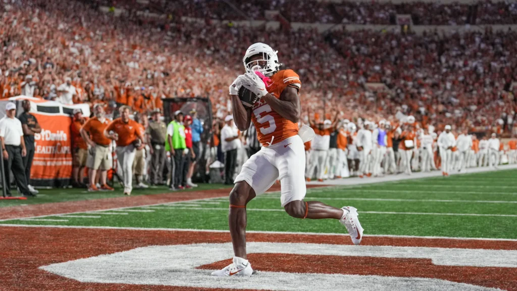 Sep 21, 2024; Austin, Texas, USA; Texas Longhorns wide receiver Ryan Wingo (5) catches a touchdown pass in the first half against the Louisiana Monroe Warhawks. | Daniel Dunn-Imagn Images