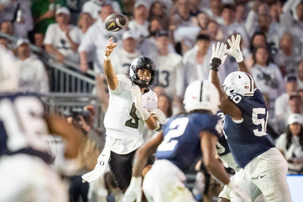 Oregon quarterback Dante Moore throws a pass as the Oregon Ducks face the Penn State Nittany Lions on Sept. 27, 2025, at Beaver Stadium in University Park, Pennsylvania. | Image Credit: A to Z Sports