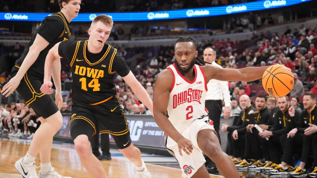 Mar 12, 2026; Chicago, IL, USA; Iowa Hawkeyes guard Bennett Stirtz (14) defends Ohio State Buckeyes guard Bruce Thornton (2) during the first half at United Center. Mandatory Credit: David Banks-Imagn Images | David Banks-Imagn Images