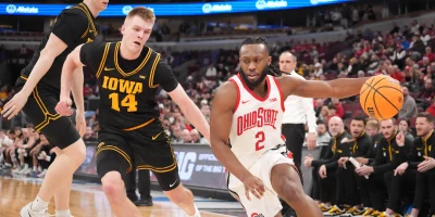 Mar 12, 2026; Chicago, IL, USA; Iowa Hawkeyes guard Bennett Stirtz (14) defends Ohio State Buckeyes guard Bruce Thornton (2) during the first half at United Center. Mandatory Credit: David Banks-Imagn Images | David Banks-Imagn Images
