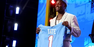 PITTSBURGH, PENNSYLVANIA – APRIL 23: Carnell Tate of Ohio State poses after being selected fourth overall pick by the Tennessee Titans during Round One of the 2026 NFL Draft at Acrisure Stadium on April 23, 2026 in Pittsburgh, Pennsylvania. (Photo by Emilee Chinn/Getty Images)