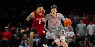 Ohio State Buckeyes guard Gabe Cupps (4) dribbles the ball against Wisconsin Badgers guard Nick Boyd (2) in the second half of the NCAA game at Value City Arena on Tuesday, Feb. 17, 2026 in Columbus, Ohio. | Samantha Madar/Columbus Dispatch / USA TODAY NETWORK via Imagn Images