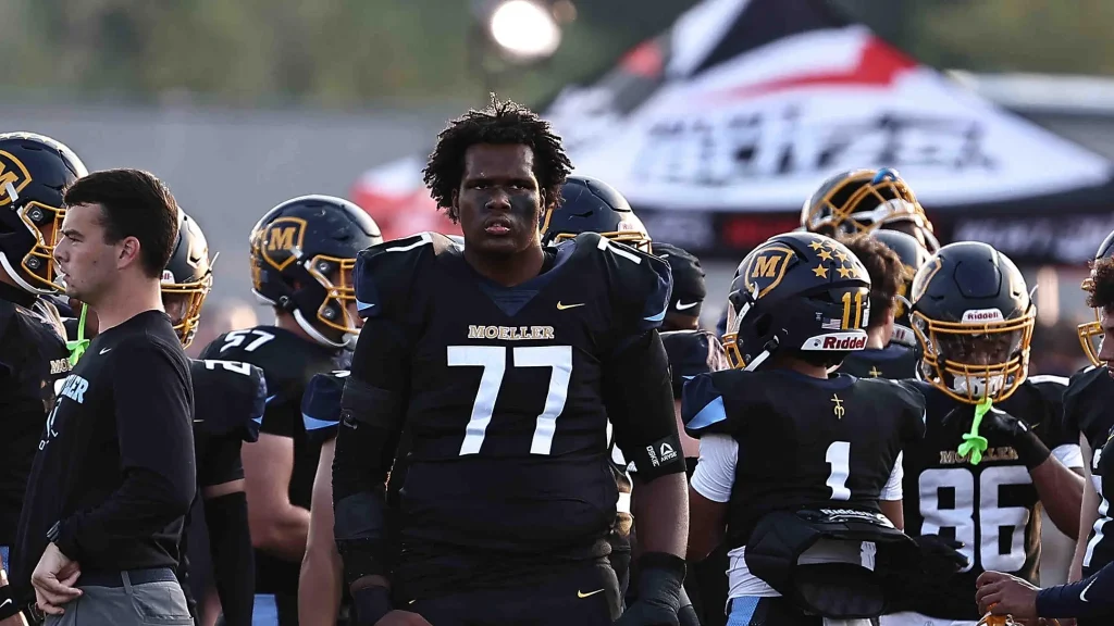 Moeller offensive lineman Kalel Johnson (77) gets ready on the field before their football game against St. Xavier Friday, Sept. 19, 2025. | Tony Tribble for The Enquirer / USA TODAY NETWORK via Imagn Images