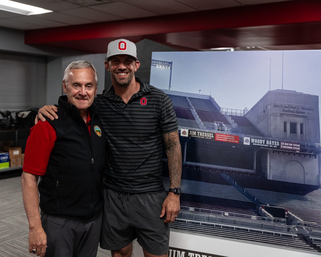 Former Ohio State head coach Jim Tressel with his former player and current linebackers coach james Laurinaitis | Image Credit: Ohio State Football
