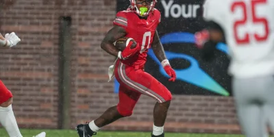 Baylor's David Gabriel Georges (0) carries the ball in the end zone for a touchdown during the Division II-AAA championship game at Finley Stadium in Chattanooga, Tenn., on Dec. 4, 2025. Angelina Alcantar/News Sentinel