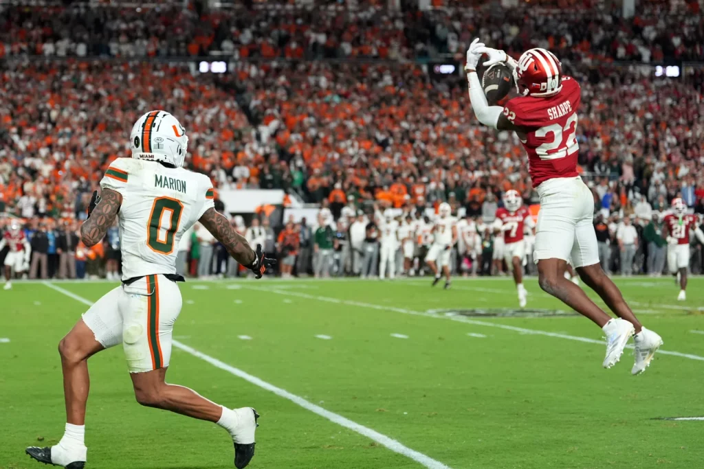 Indiana defensive back Jamari Sharpe intercepts a pass against Miami during the second half of the College Football Playoff national championship game, Monday, Jan. 19, 2026, in Miami Gardens, Fla. | Rebecca Blackwell/AP