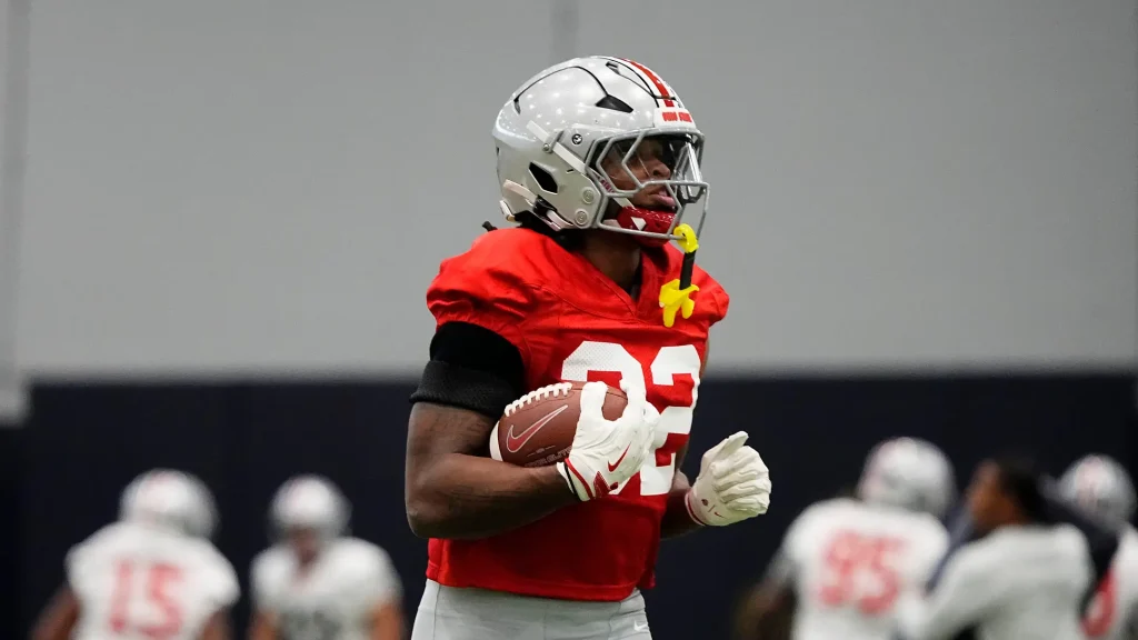 Ohio State Buckeyes running back Isaiah West (32) runs during practice at Highland Park High School in Dallas prior to the College Football Playoff matchup against the Miami (FL) Hurricanes on Dec. 29, 2025. | USA TODAY Network via Reuters Connect