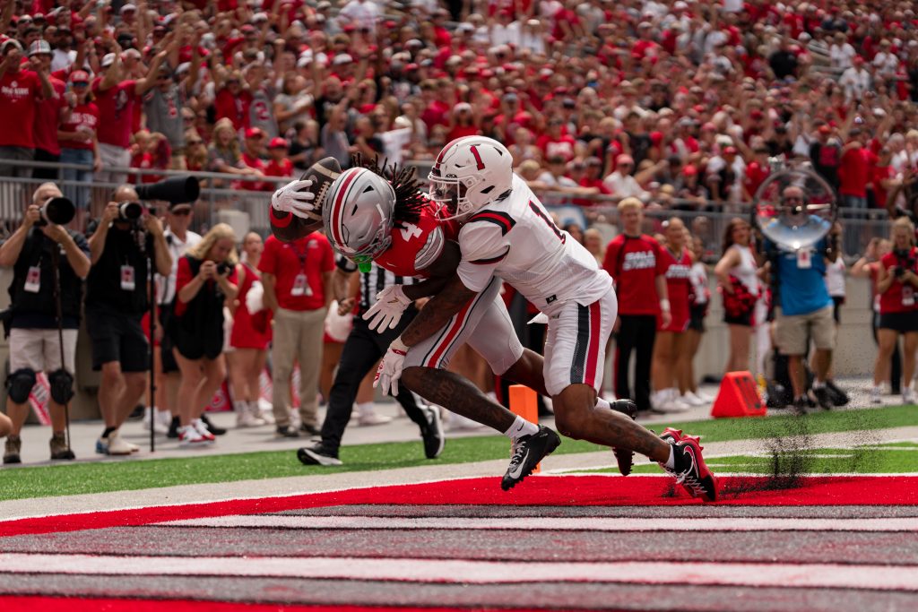 Ohio State wide receiver Jeremiah Smith catching a one-handed touchdown pass against Ball State | Image Credit: Ohio State Football