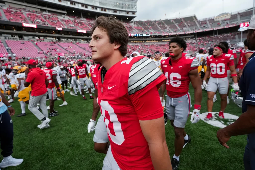 Ohio State Buckeyes quarterback Julian Sayin (10) leaves the field following the NCAA football game against the Kent State Golden Flashes at Ohio Stadium in Columbus on Sept. 19, 2026. Ohio State won 59-3. Adam Cairns/Columbus Dispatch, USA TODAY Network Via Reuters Co