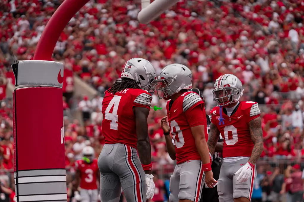 Ohio State wide receiver Jeremiah Smith and quarterback Julian Sayin celebrating a touchdown against Ball State | Image Credit: Ohio State Football