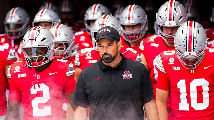 Ohio State Buckeyes head coach Ryan Day takes the field with his players before the NCAA football game against the Ball State Cardinals at Ohio Stadium on Sept. 5, 2026 in Columbus, Ohio. | USA TODAY Network via Reuters Connect