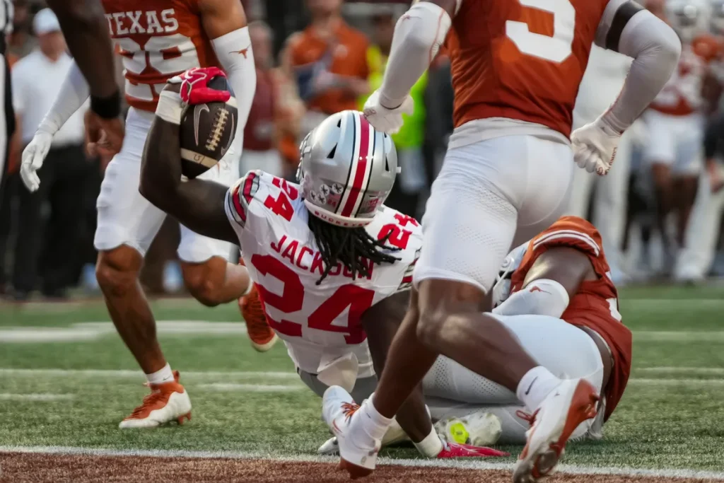 Ohio State Buckeyes running back Ja'kobi Jackson (24) scores a touchdown during the NCAA football game against the Texas Longhorns at Darrell K Royal–Texas Memorial Stadium in Austin, Texas on Sept. 12, 2026. Adam Cairns/Columbus Dispatch