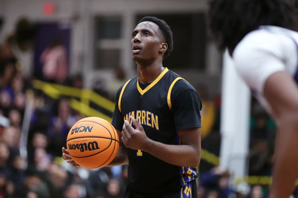 Warren’s Jaxson Davis prepares to shoot a free throw during a North Suburban Conference game at Waukegan on Saturday, Dec. 13, 2025. (Mark Ukena / News-Sun)
