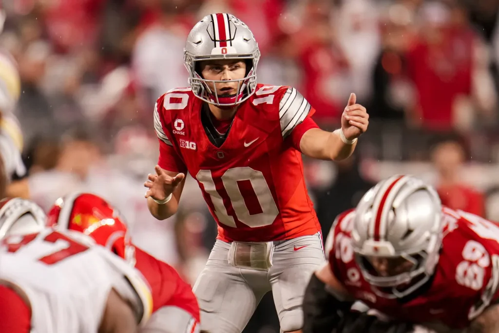 Ohio State Buckeyes quarterback Julian Sayin (10) motions during the NCAA football game against the Maryland Terrapins at Ohio Stadium in Columbus on Oct. 10, 2026. Adam Cairns/Columbus Dispatch, USA TODAY Network Via Reuters Co