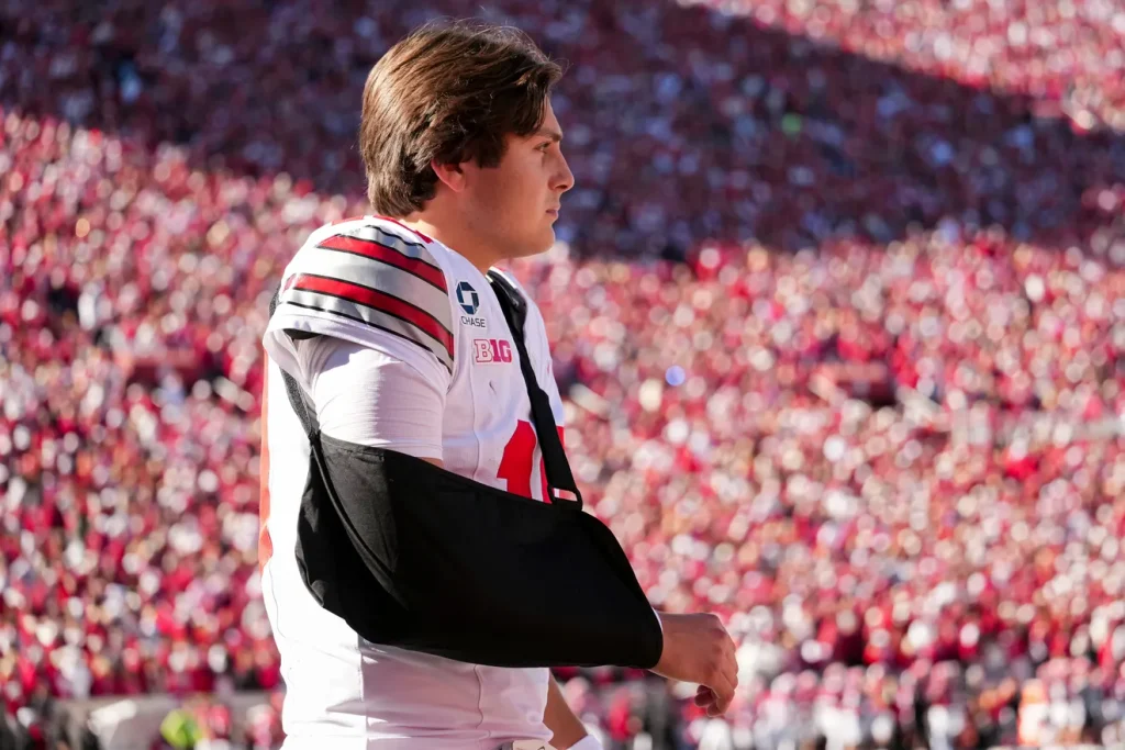 Ohio State Buckeyes quarterback Julian Sayin (10) returns to the field in a sling during the NCAA football game against the Indiana Hoosiers at Memorial Stadium Stadium in Bloomington, Ind. on Oct. 17, 2026. Adam Cairns/Columbus Dispatch