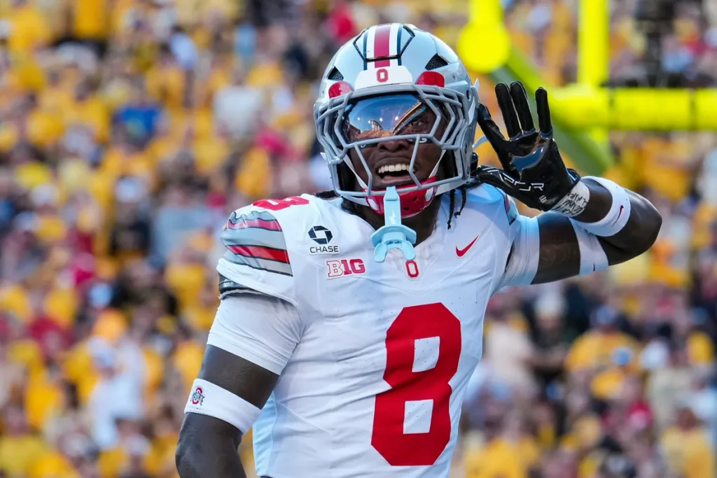 Ohio State Buckeyes safety Jaylen McClain (8) celebrates an interception during the NCAA football game against the Iowa Hawkeyes at Kinnick Stadium in Iowa City on Oct. 3, 2026. Ohio State on 31-14.Adam Cairns/Columbus Dispatch, USA TODAY Network Via Reuters Co