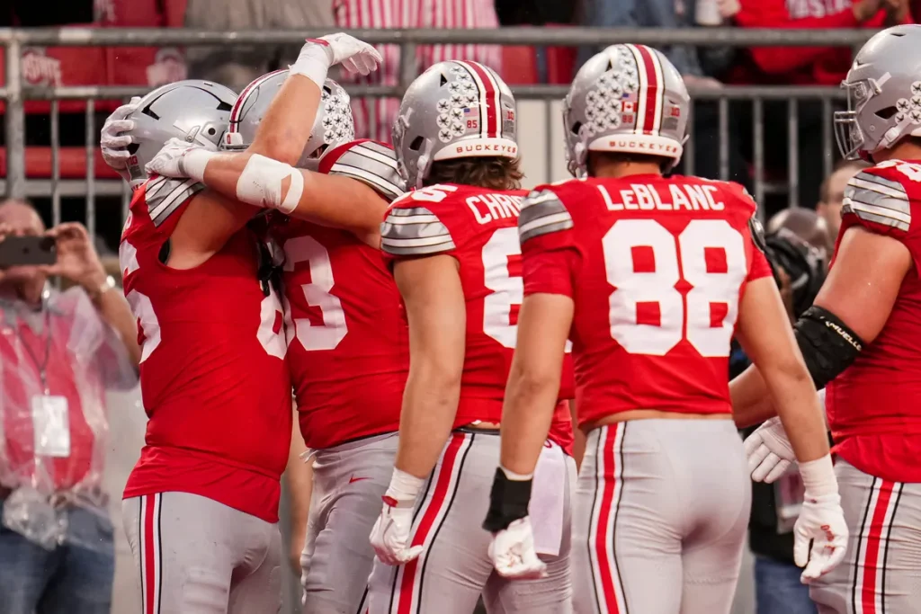 Teammates celebrate a touchdown by Ohio State Buckeyes tight end Mason Williams (86) during the NCAA football game against the Maryland Terrapins at Ohio Stadium in Columbus on Oct. 10, 2026. Adam Cairns/Columbus Dispatch