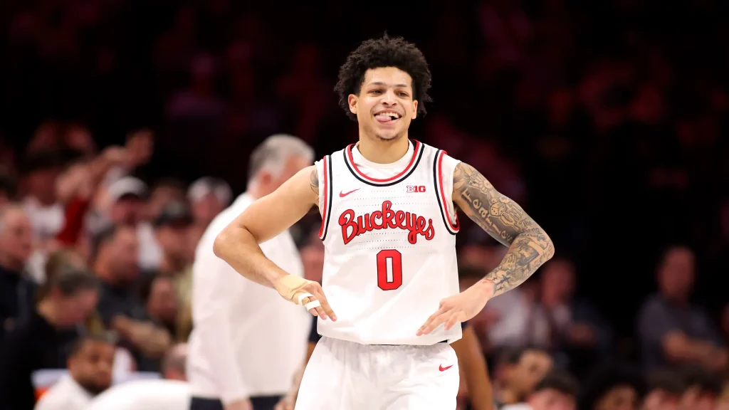 Mar 1, 2026; Columbus, Ohio, USA; Ohio State Buckeyes guard John Mobley Jr. (0) celebrates during the second half against the Purdue Boilermakers at Value City Arena. Mandatory Credit: Joseph Maiorana-Imagn Images | IMAGN IMAGES via Reuters Connect